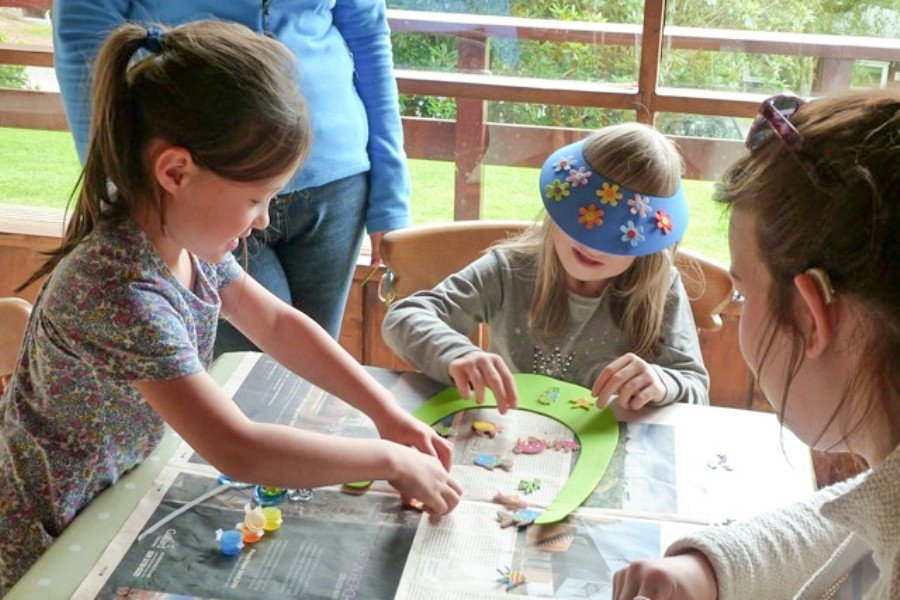 Children from Jennie's Children's Trust playing in a lodge at Timber Hill